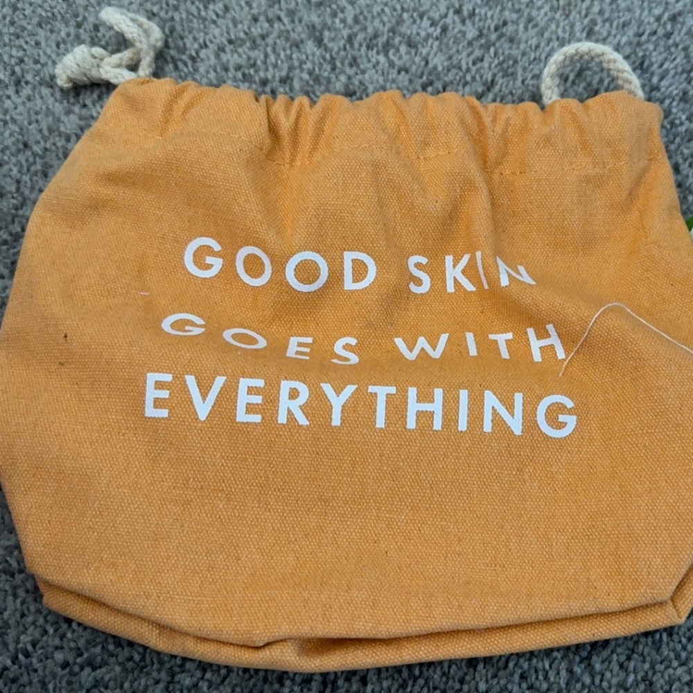 Origins " Good Skin Goes With Everything" Orange Drawstring bag